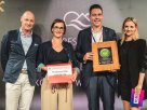 Das Resort Hof Weissbad aus dem Kanton Appenzell Innerrhoden ist der Gewinner des Green Sleeping Awards 2026 powered by Swissfeel und erweitert die Liste der ausgezeichneten Häuser erstmals um ein Hotel aus der Schweiz. Der Award wurde im Rahmen der Abendgala des Branchenevents der HSMA Deutschland e.V. verliehen und würdigt Hotels, die Nachhaltigkeit dort konsequent umsetzen, wo sie das Kerngeschäft der Hotellerie unmittelbar berührt: bei dem Schlaf. Seit seiner Einführung im Jahr 2022 wurde der Förderpreis bereits zum fünften Mal vergeben. Damit setzt der Green Sleeping Award ein weiteres Zeichen für die wachsende Bedeutung nachhaltiger Beschaffung und ressourcenschonender Konzepte in der Hotellerie. Denn während Komfort und Gastfreundschaft unverändert die zentralen Qualitätsversprechen eines Hotels bleiben, entscheidet zunehmend auch der verantwortungsvolle Umgang mit Ressourcen darüber, wie Betriebe von Gästen wahrgenommen werden. „Immer mehr Reisende legen Wert auf Nachhaltigkeit und lassen dies bei der Wahl ihrer Unterkunft mit einfliessen. Der Green Sleeping Award bietet jenen Hotels ein Alleinstellungsmerkmal, deren ehrliches Engagement für Nachhaltigkeit auch beim Hotelbett eine besondere Würdigung verdient. Da es kein Ausstattungselement im Hotel gibt, welches den Gästen wichtiger wäre, verbindet sich mit diesem besonderen Award die Chance, die Gäste von sich zu überzeugen", so Christian Reschke, Mitglied der Geschäftsleitung von Swissfeel. Dass nachhaltiges Wirtschaften weit über den Hotelbetrieb selbst hinausreicht, machte auch Bettenexperte Jens Rosenbaum vom Fachmagazin „Schlafen Spezial“ in seiner Keynote auf dem HSMAday deutlich. "Der Green Sleeping Award zeigt auch, dass Nachhaltigkeit dort besonders glaubwürdig wird, wo sie den Gast unmittelbar erreicht. Nämlich im Bett. Mit dem Resort Hof Weissbad wurde erneut ein Hotel ausgezeichnet, das diesen Anspruch konsequent lebt und damit ein wichtiges Signal für die gesamte Branche setzt", ergänzt Philipp Hangartner, Inhaber von Swissfeel. Auch für die HSMA Deutschland e.V. unterstreicht die Auszeichnung die strategische Bedeutung nachhaltiger Lösungen für die Zukunft der Branche. Anna Heuer, Verbandsgeschäftsführerin der HSMA Deutschland e.V., fügt hinzu: "Wir freuen uns sehr, dass dieser besondere Award, der mit dem Bett das Kerngeschäft der Hotellerie berührt, erneut auf unserer Veranstaltung verliehen wurde. Sustainability ist für uns als Fachverband ein unverzichtbarer Bestandteil einer zukunftsorientierten Weiterentwicklung der Hotellerie.“ Mit dem diesjährigen Gewinner setzt sich darüber hinaus eine Entwicklung fort, die den Green Sleeping Award seit seiner Einführung prägt. Nach dem BioHotel WildLand (Niedersachsen), Hotel Rehlegg (Bayern), Hotel Birke (Schleswig-Holstein), Waldhotel Stuttgart (Baden-Württemberg) und Hotel Schwarzwald Panorama (Baden-Württemberg) erweitert das Resort Hof Weissbad nun die Liste der ausgezeichneten Häuser und macht zugleich deutlich, dass nachhaltiger Schlaf längst keine nationale Initiative mehr ist, sondern ein Qualitätsmerkmal der gesamten DACH-Hotellerie geworden ist. Rund 80 Prozent der möglichen CO₂-Einsparungen eines Hotels liegen nach ihren Ausführungen in der Lieferkette. Umso wichtiger sei es, Lieferanten auszuwählen, die ihre Nachhaltigkeitsleistungen transparent nachweisen und durch anerkannte Zertifizierungen belegen können. Genau an dieser Schnittstelle setzt Swissfeel an. Der Schweizer Hersteller nachhaltiger Bettsysteme verfügt unter anderem über Zertifizierungen von EcoVadis, OEKO-TEX sowie Service Allergie Suisse, einem Tochterunternehmen des aha! Allergiezentrum Schweiz. Gleichzeitig verfolgt das Unternehmen mit seinem doppelten Kreislaufsystem SWISSFEEL-2-CYCLE einen Ansatz, der Nachhaltigkeit und Wirtschaftlichkeit miteinander verbindet.